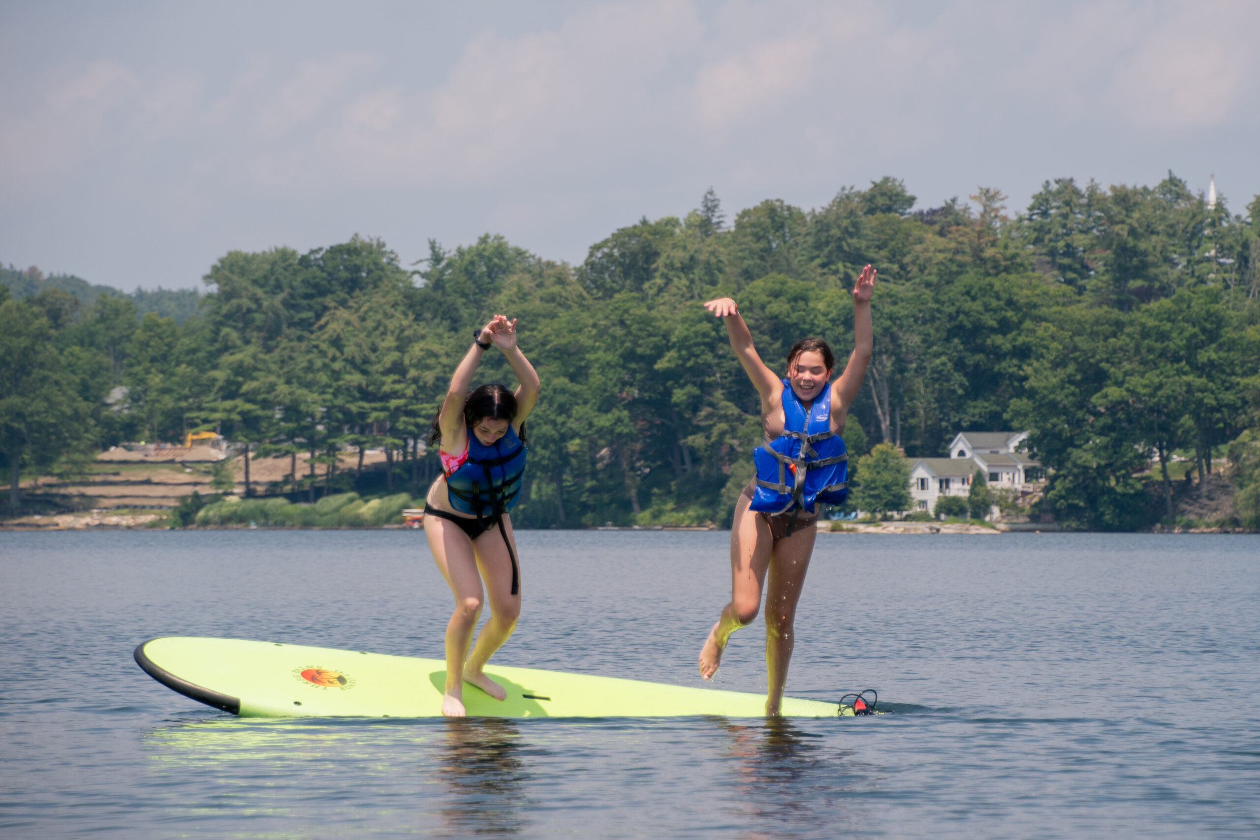 Lax and Lead campers on paddle boards